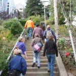 Nov. 2003 Water Walking tour on Vulcan Steps (Photo: Rich Coffin) Folks walking up cement steps in a garden
