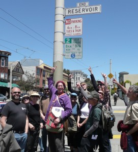 Water walking tour group with Reservoir Street sign